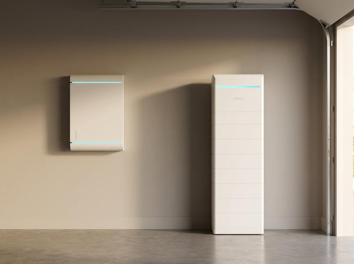 Kora Powerblocks battery tower and Smart Panel installed in a residential garage utility space.