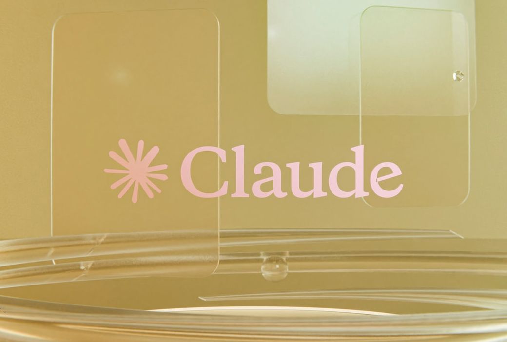 The image features a softly illuminated background with translucent panels displaying the name 'Claude' in a prominent pink font. The design conveys a modern and sleek aesthetic, suggesting a focus on innovation or technology. — Credit: Photo by Brecht Corbeel on Unsplash