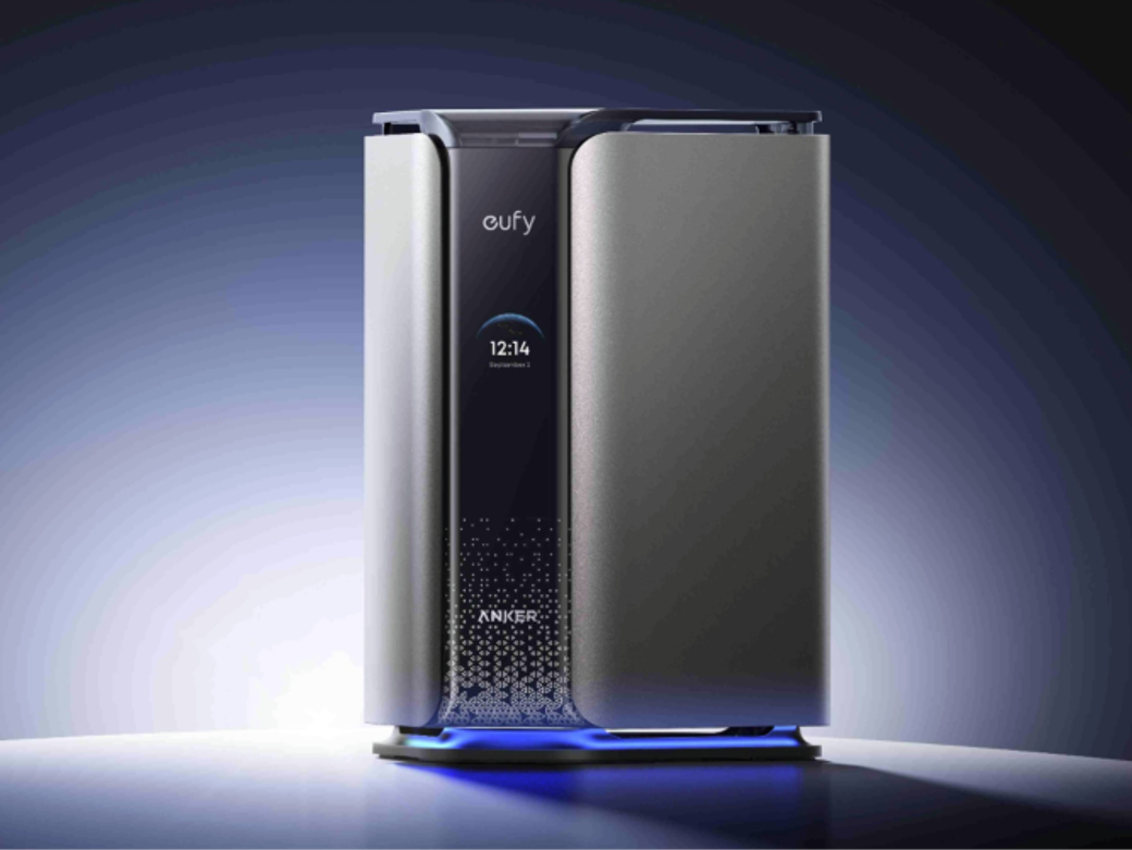 The image showcases a sleek, modern device from Eufy, featuring a digital display that shows the time as 12:14. The device is encased in a metallic housing with a clean, minimalistic design, set against a gradient background that enhances its futuristic appeal.