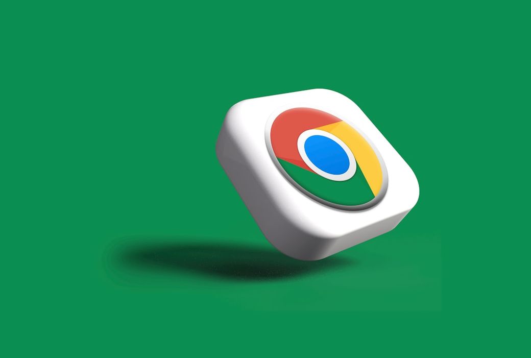 The image features a 3D representation of the Google Chrome logo, which appears to be floating against a vibrant green background. The logo is stylized in a glossy finish, emphasizing its colors and design. — Credit: Photo by Rubaitul Azad on Unsplash