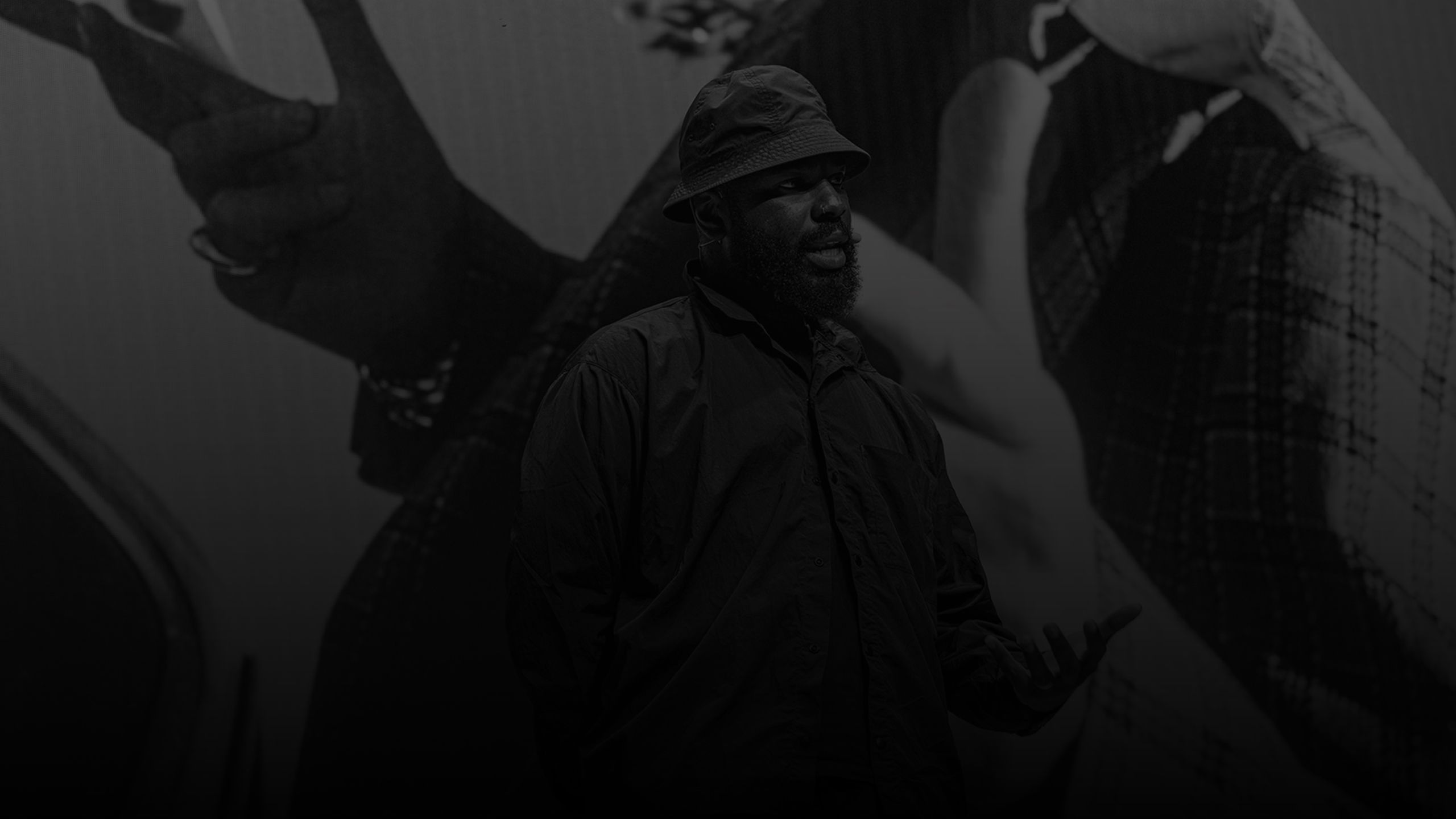Black and white photo of speaker at the Brisbane Powerhouse amphitheatre during The Design Conference