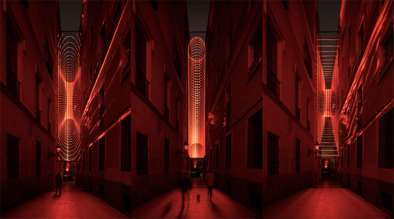 A building facade in Madrid covered in glowing green binary code in SpY’s installation “Data”
