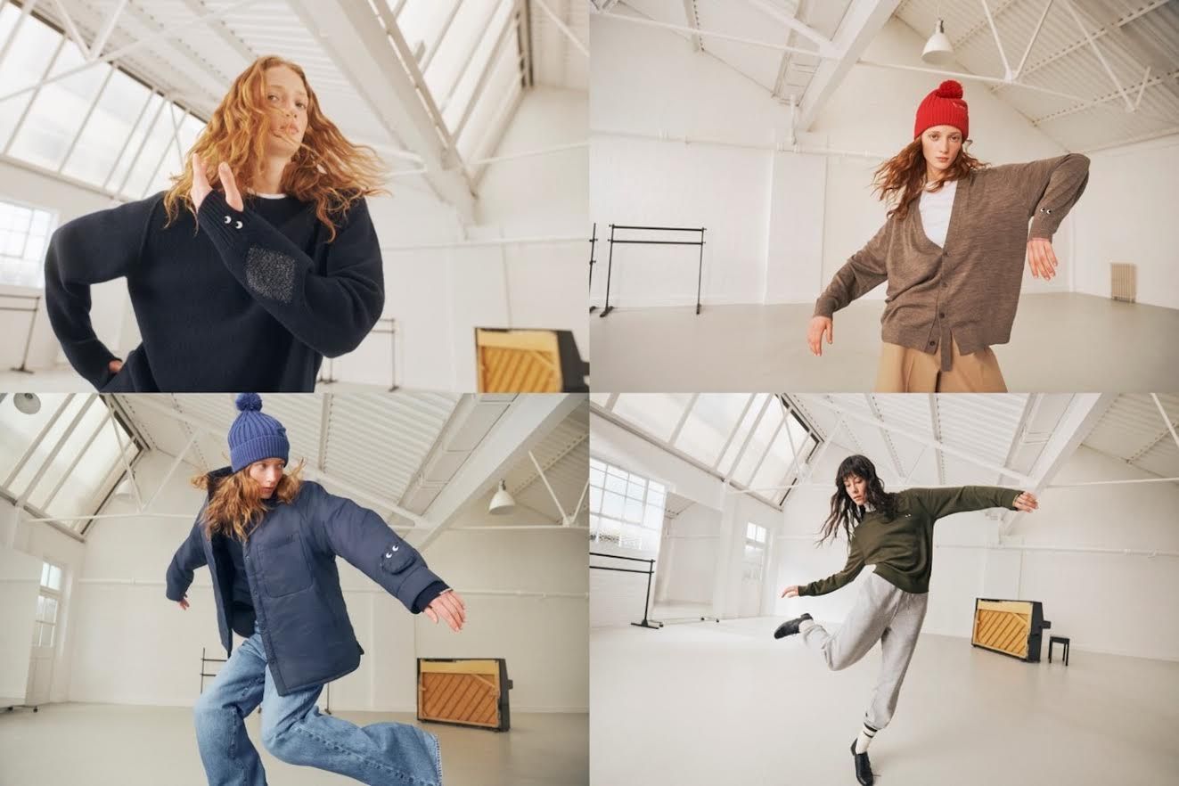 Four studio shots of the same model in Uniqlo x Anya Hindmarch pieces: a navy merino sweater with embroidered eyes and a darned patch at the cuff, a brown cardigan worn with a red bobble hat, a navy padded jacket with an eye motif on the pocket flap and a blue bobble hat, and an olive sweatshirt with grey joggers