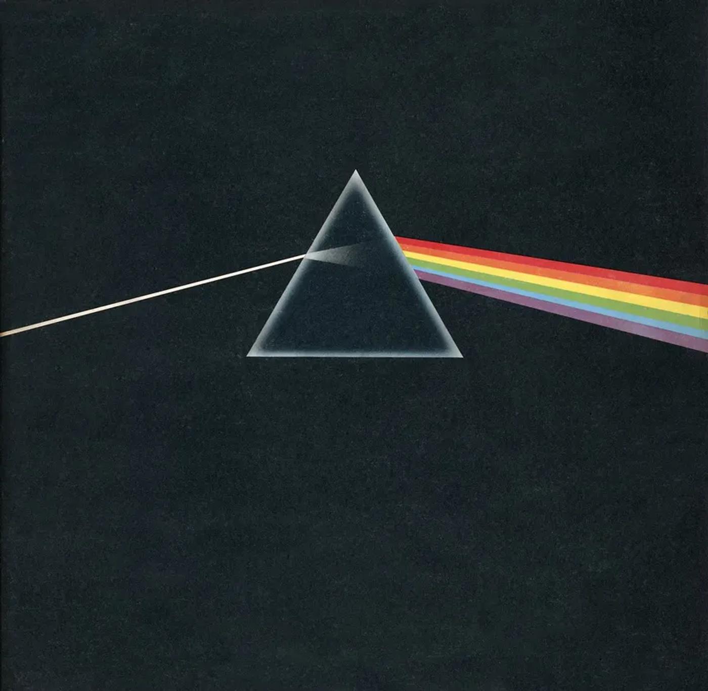 Prism splitting light into a rainbow on Pink Floyd’s black Dark Side of the Moon album cover