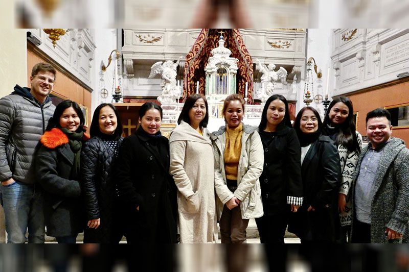 Ten members of the Philippine Venice Biennale team gathered before the altar of Santa Maria della Fava