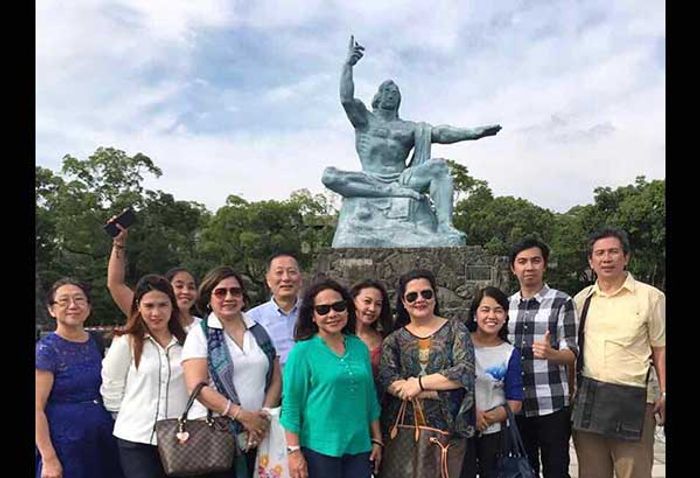 The tour group gathered at Nagasaki Peace Park