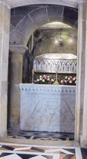 Silver coffer said to hold the remains of Saint James, set behind flowers in the cathedral crypt