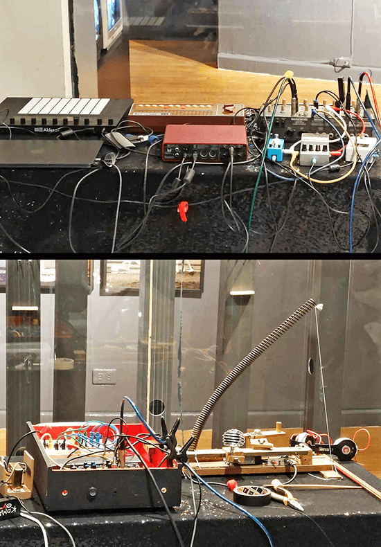 A tabletop of gears, motors and hand-built machines Somatosonic uses to make music