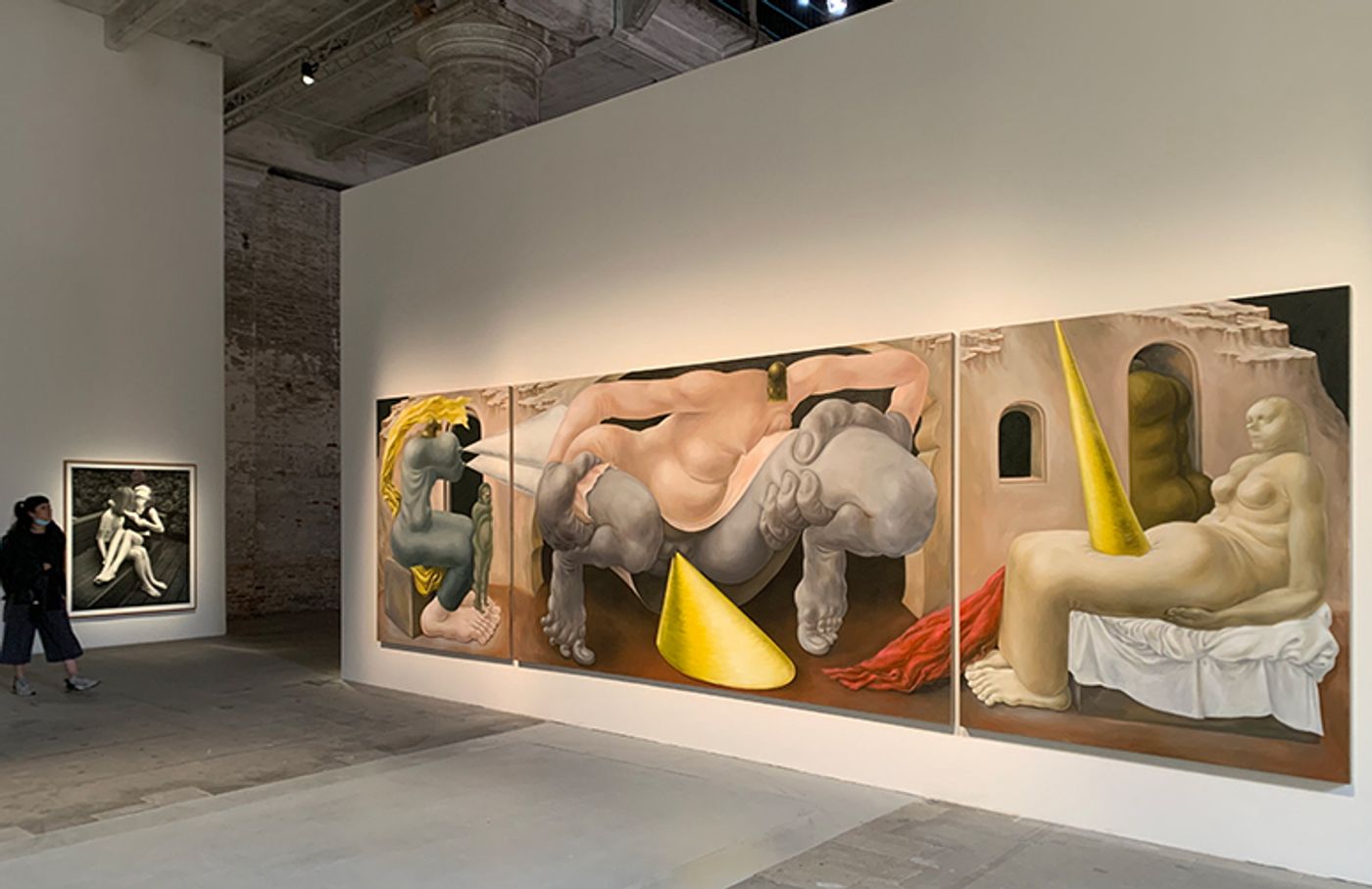Louise Bonnet’s Pisser Triptych, three canvases of contorted pale figures with yellow cones