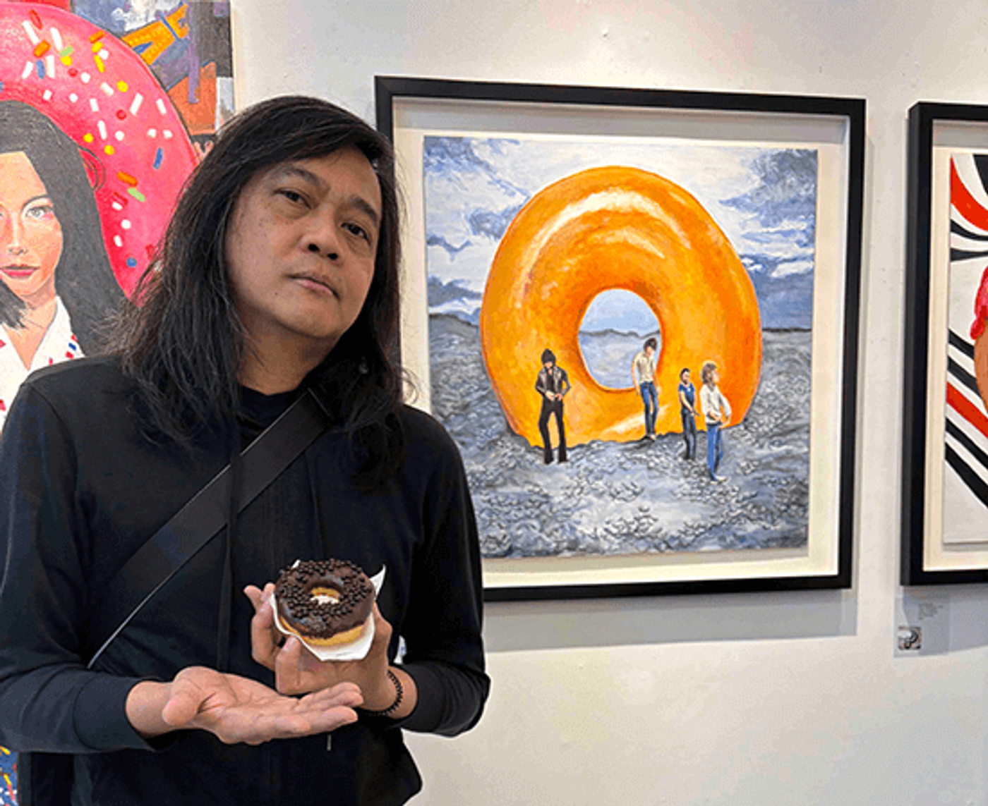 Portrait of artist and STAR Lifestyle Section columnist Igan D’Bayan standing at the gallery opening