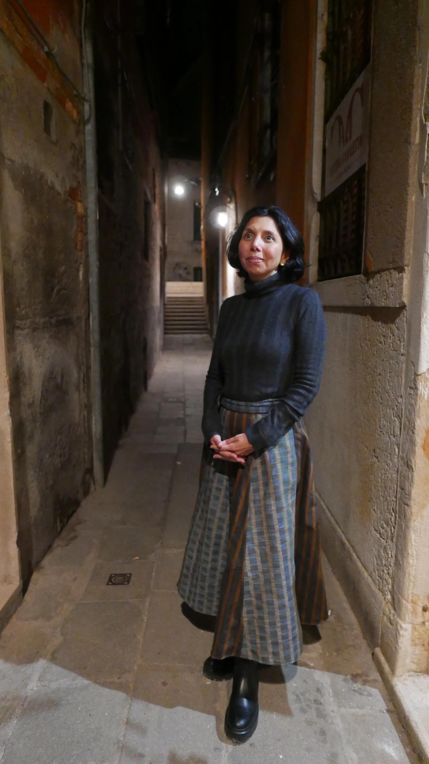 Co-curator Yael Buencamino-Borromeo standing inside the Philippine Pavilion at the Venice Biennale