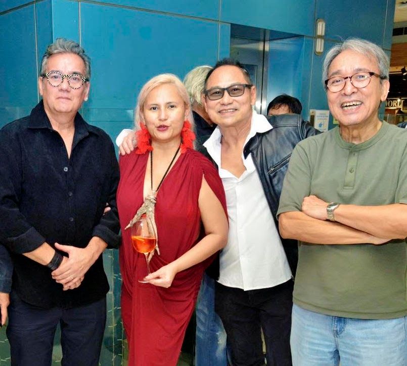 Katya Angara in red with Buddy Trinidad, Stephen Lu and Sari Ortiga at the Sorceress opening