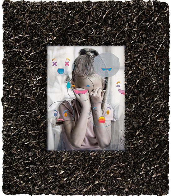 Girl hiding her face in her hands beneath floating pastel emoji faces, framed in dark sculpted roses