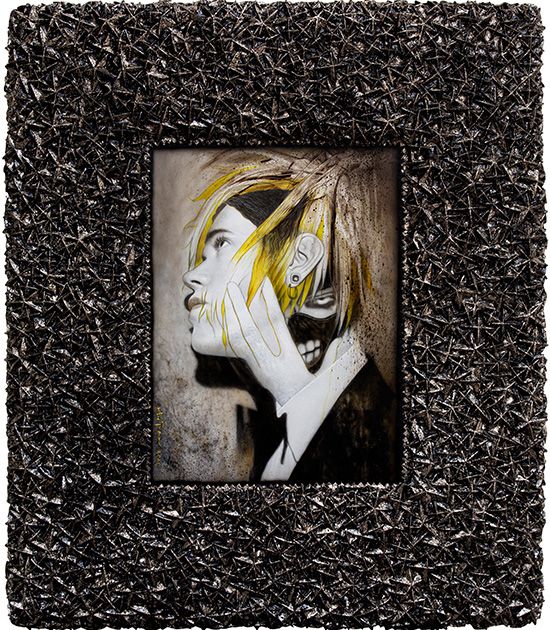 Profile portrait of a pale figure with yellow-streaked hair pressing a hand to their cheek, in a studded dark frame