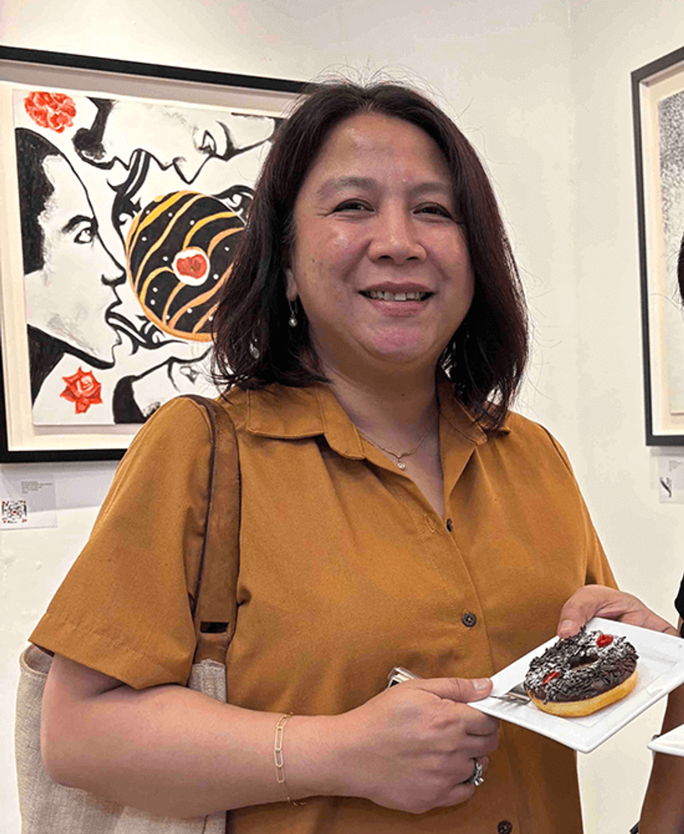 STAR Lifestyle sub-editor Lai Reyes smiling at the gallery reception