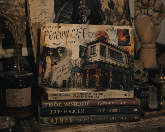 Patrons gathering at the bar inside the legendary Penguin Cafe in Malate