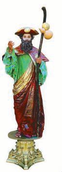 A street performer costumed as Saint James in green and red robes, holding a staff topped with gourds