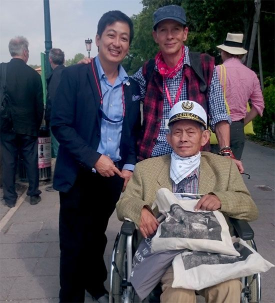 Gus Vibal and Adam Nankervis flanking David Medalla, who wears a Venezia sailor cap, on a Venice street