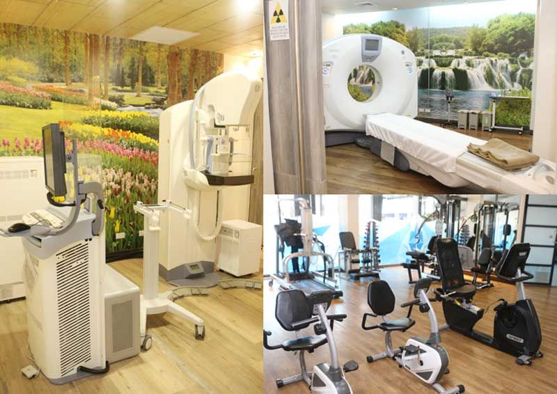 Three medical rooms: a mammography unit against a tulip-field mural, a CT scanner against a waterfall mural, and a row of exercise bikes