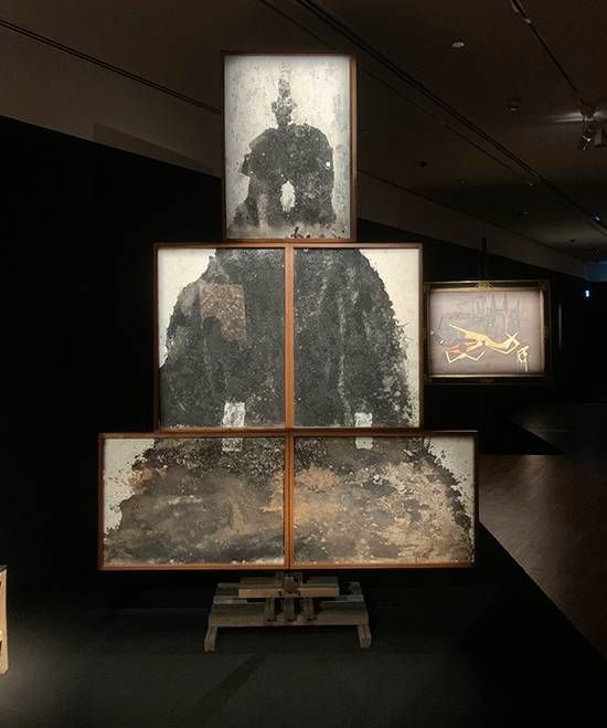 Montien Boonma’s Black Stupa: tiered framed panels of dark, ash-like material stacked into a stupa form