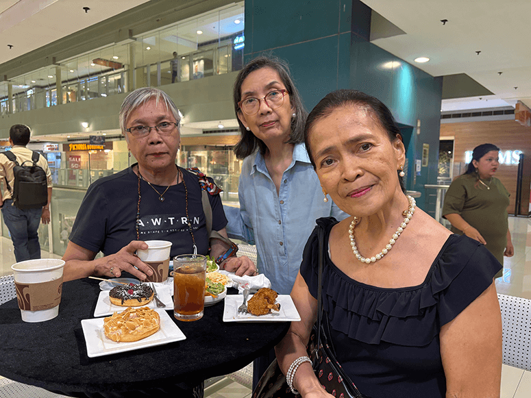 Media colleagues Linda Bolido, Chelo Formoso, and Ching Alano posing together at the art gallery