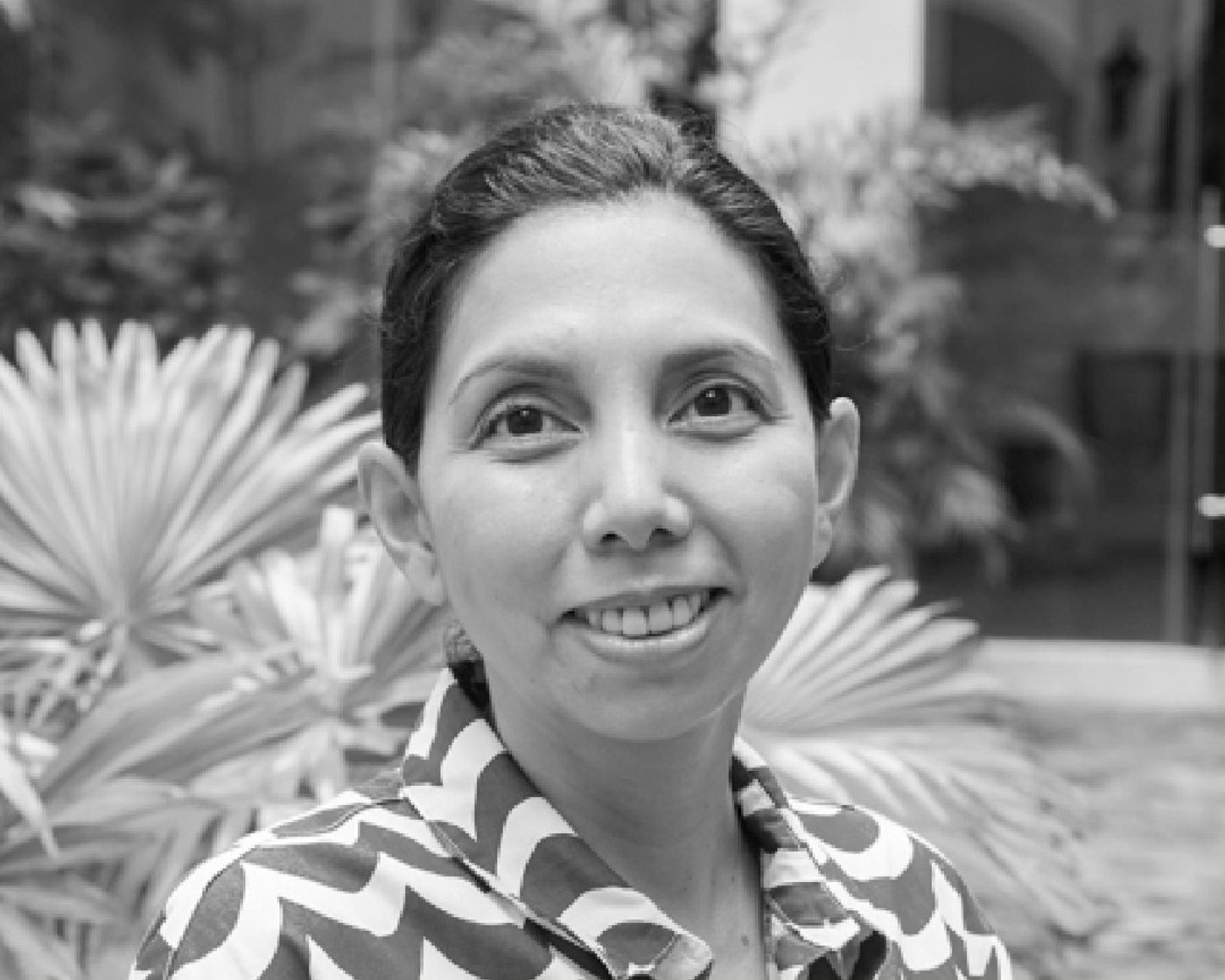 Portrait of curator Yael Buencamino-Borromeo posing inside the Philippine Pavilion