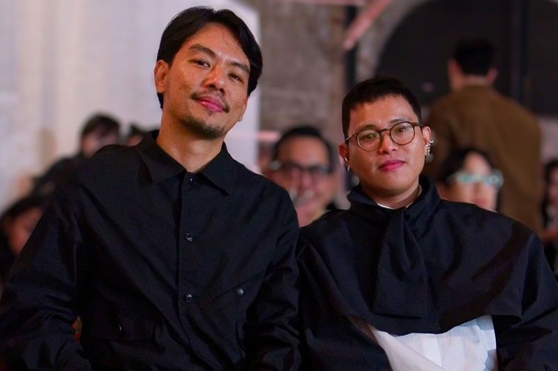 Artist Mark Salvatus and curator Carlos Quijon Jr., both in black, at the Pavilion opening in Venice