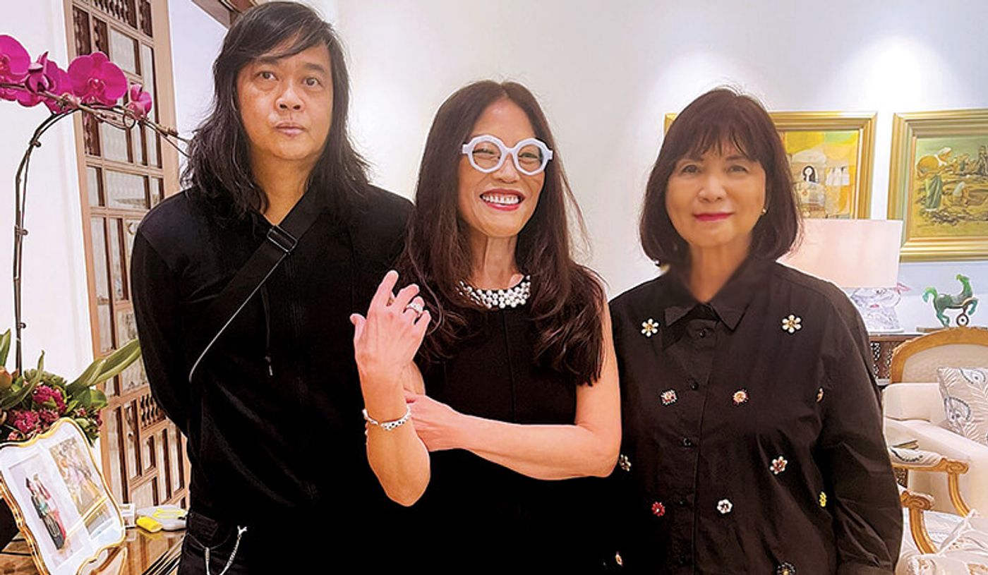 Cecile Licad flanked by author Igan D’Bayan and editor Millet Mananquil, all in black