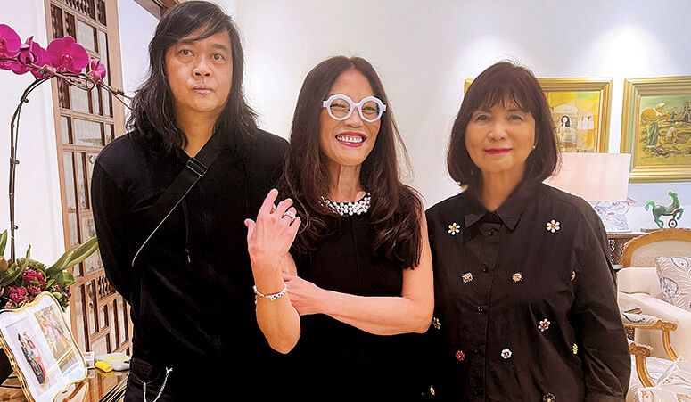 Cecile Licad flanked by author Igan D’Bayan and editor Millet Mananquil, all in black