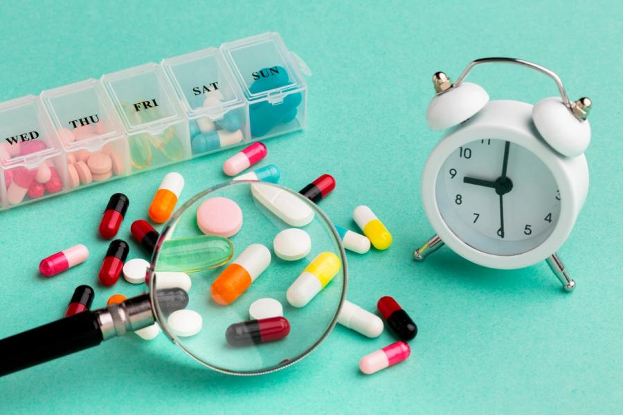 Medication adherence tracking tools like pill organizers and reminders support patients between clinic visits.