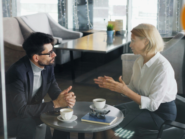 Woman and man in a meeting