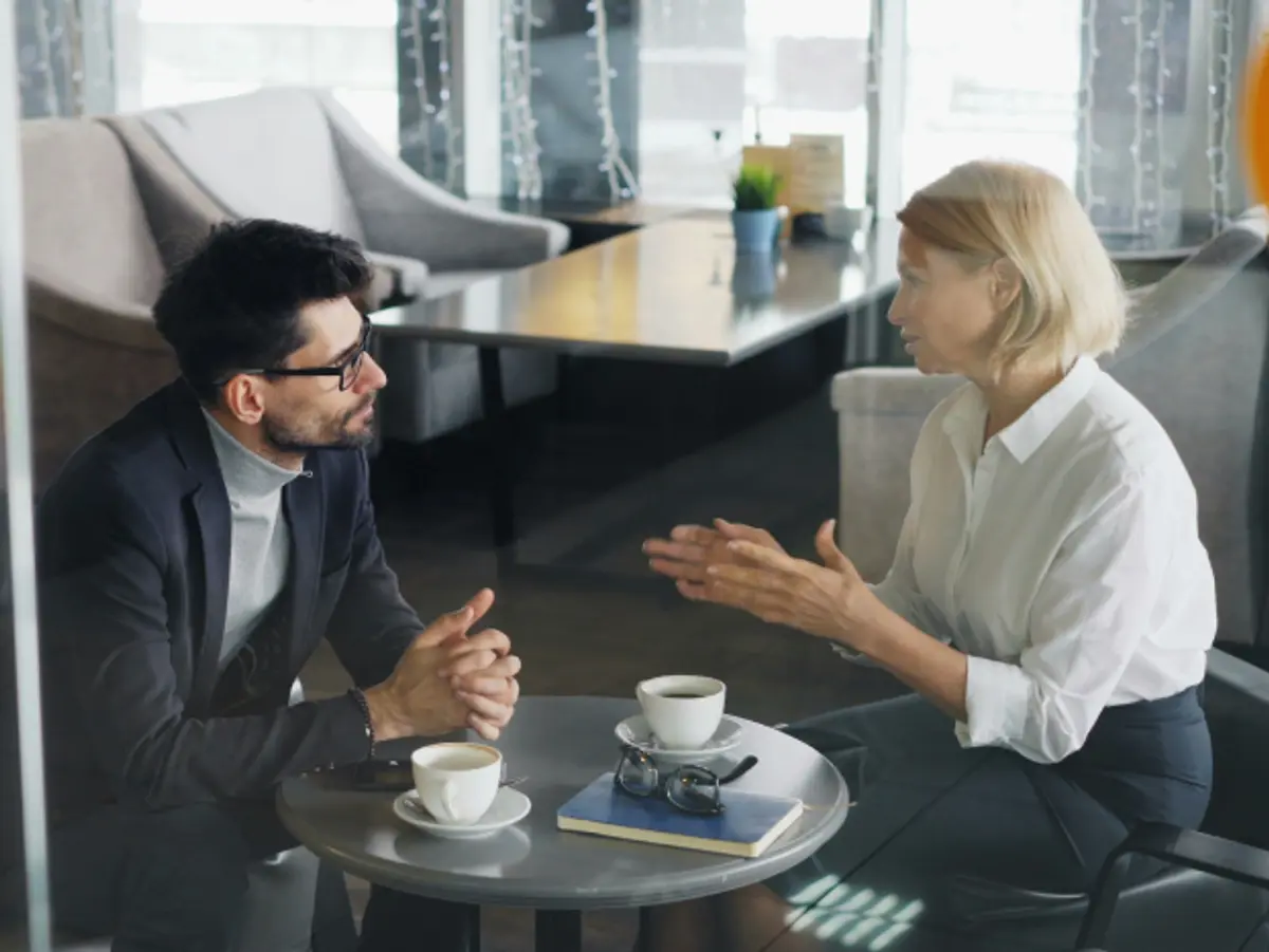 Woman and man in a meeting