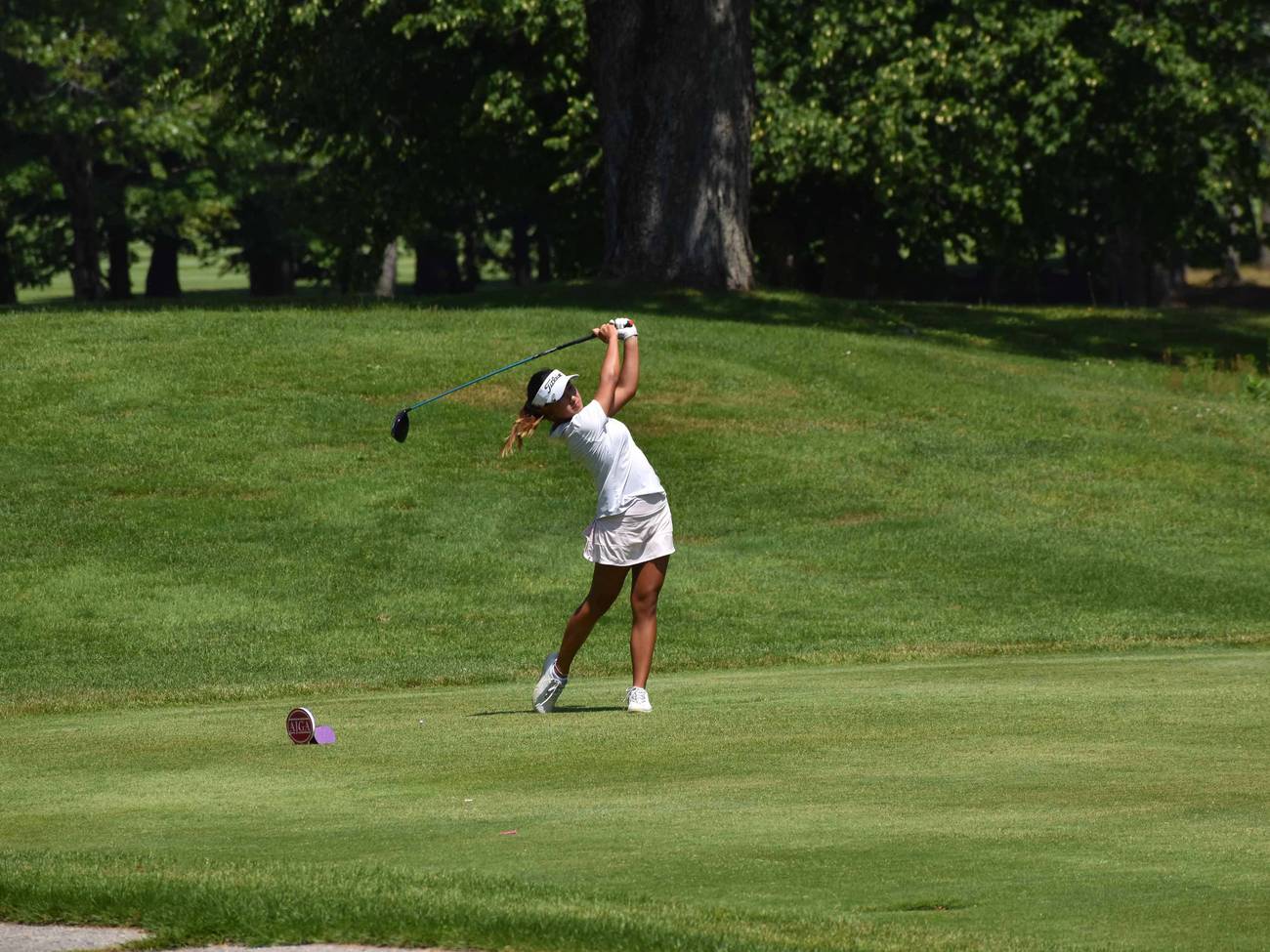 Junior Girl Teeing Off