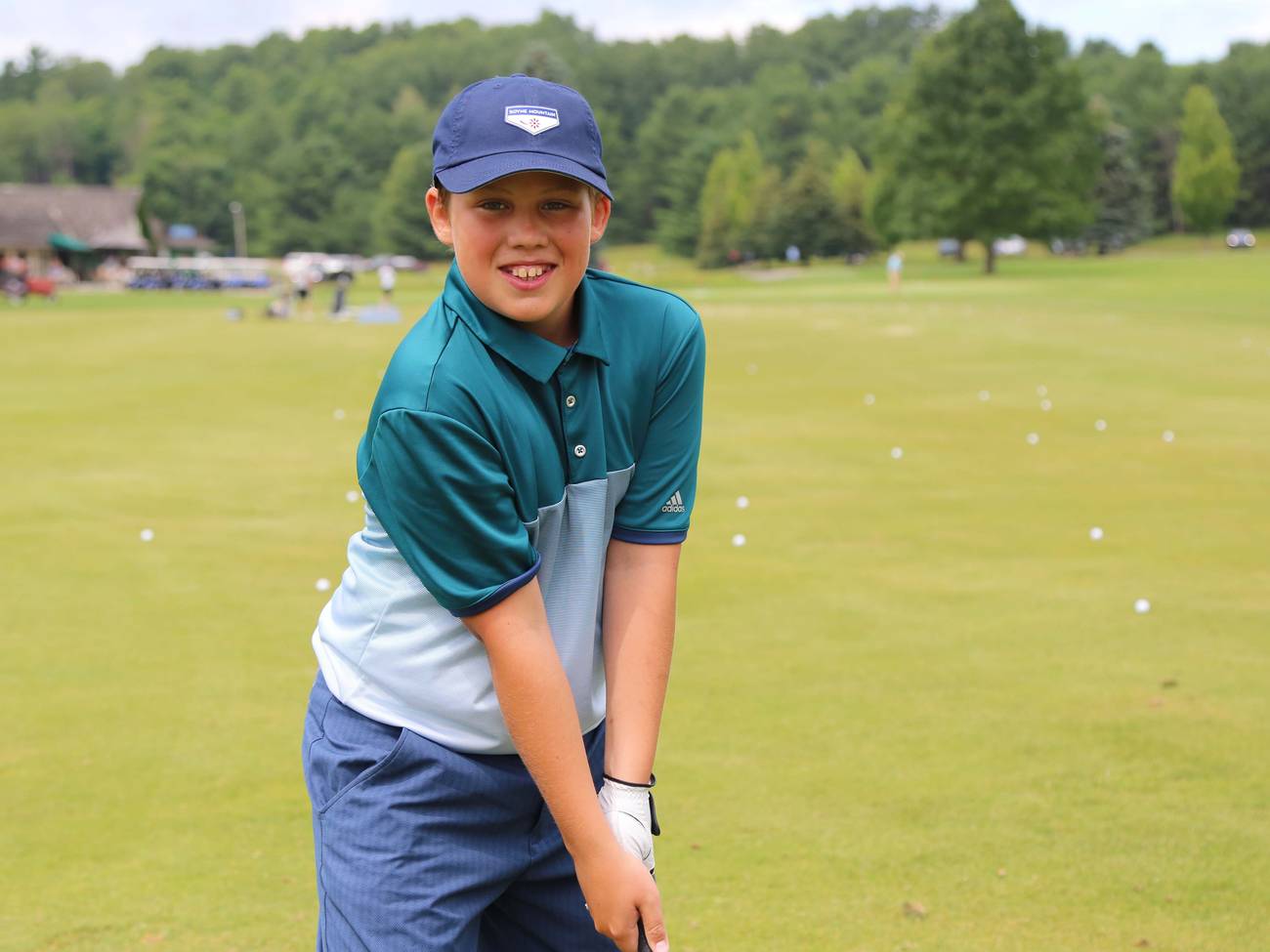 Junior smiling on course