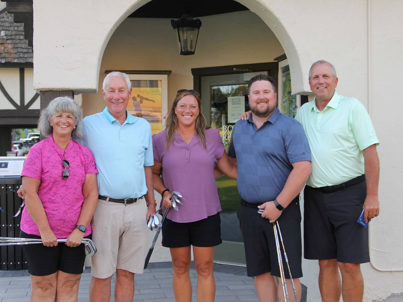 Group of golfers smiling