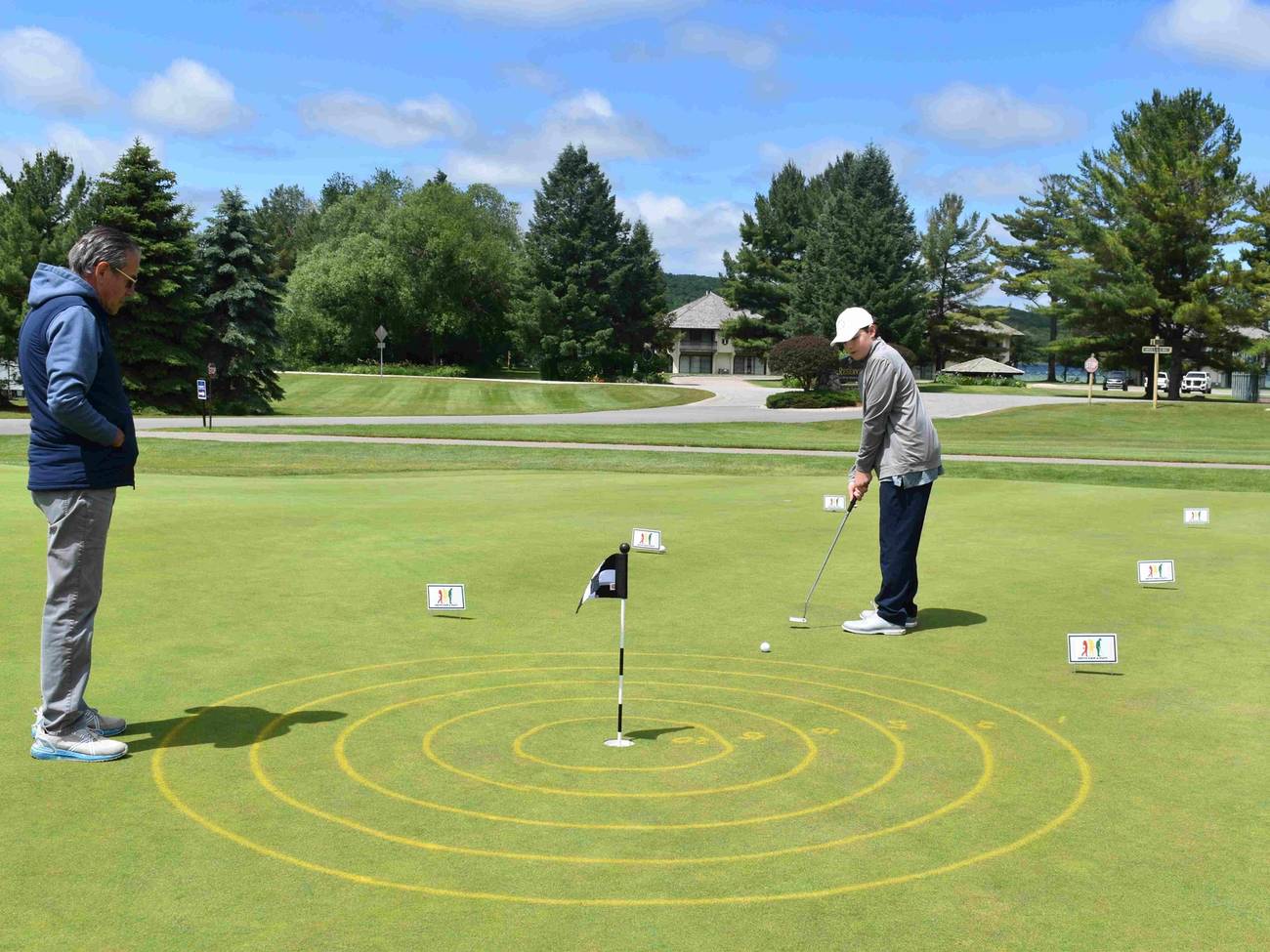 Boy Putting