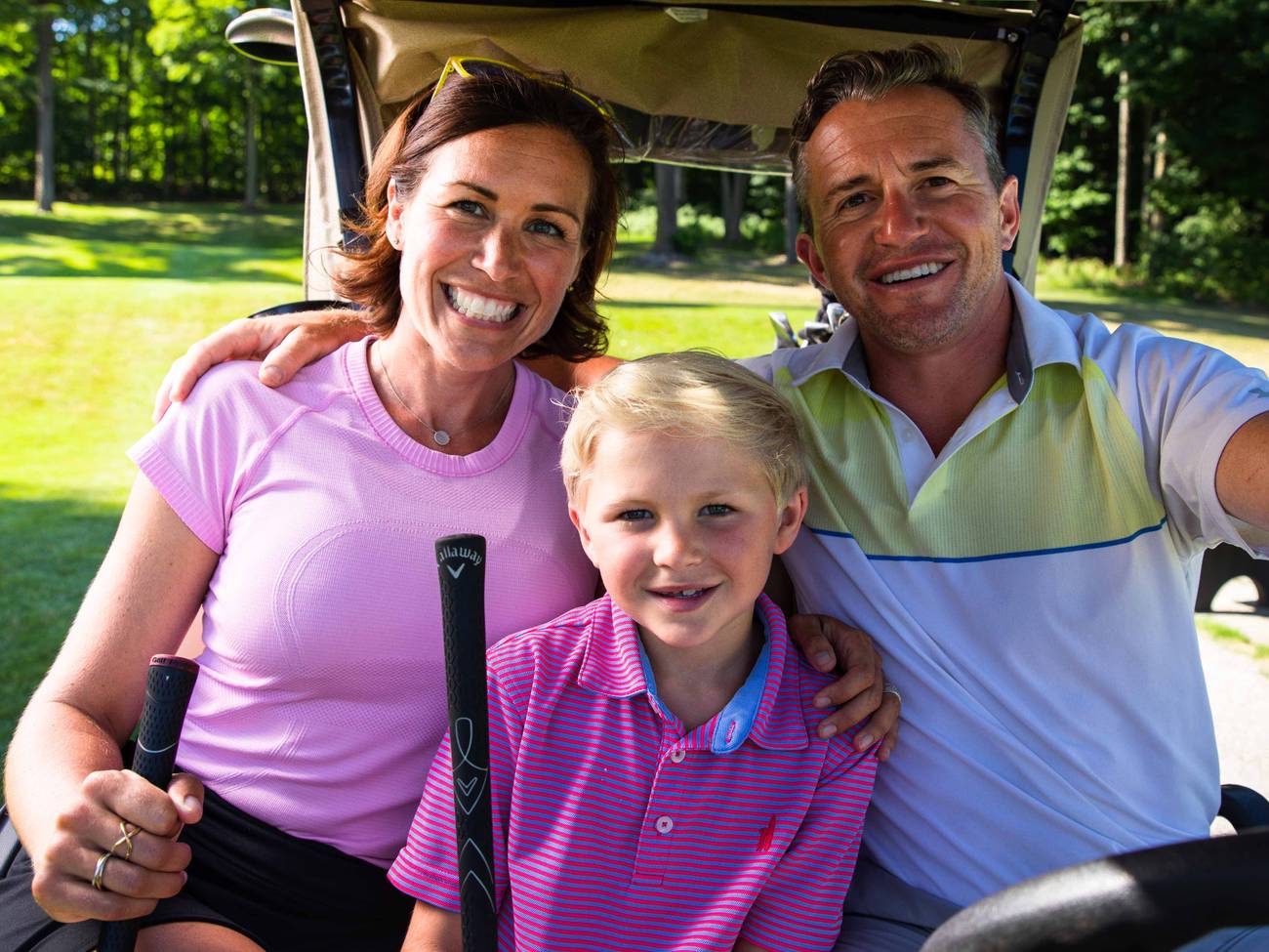 family golfing