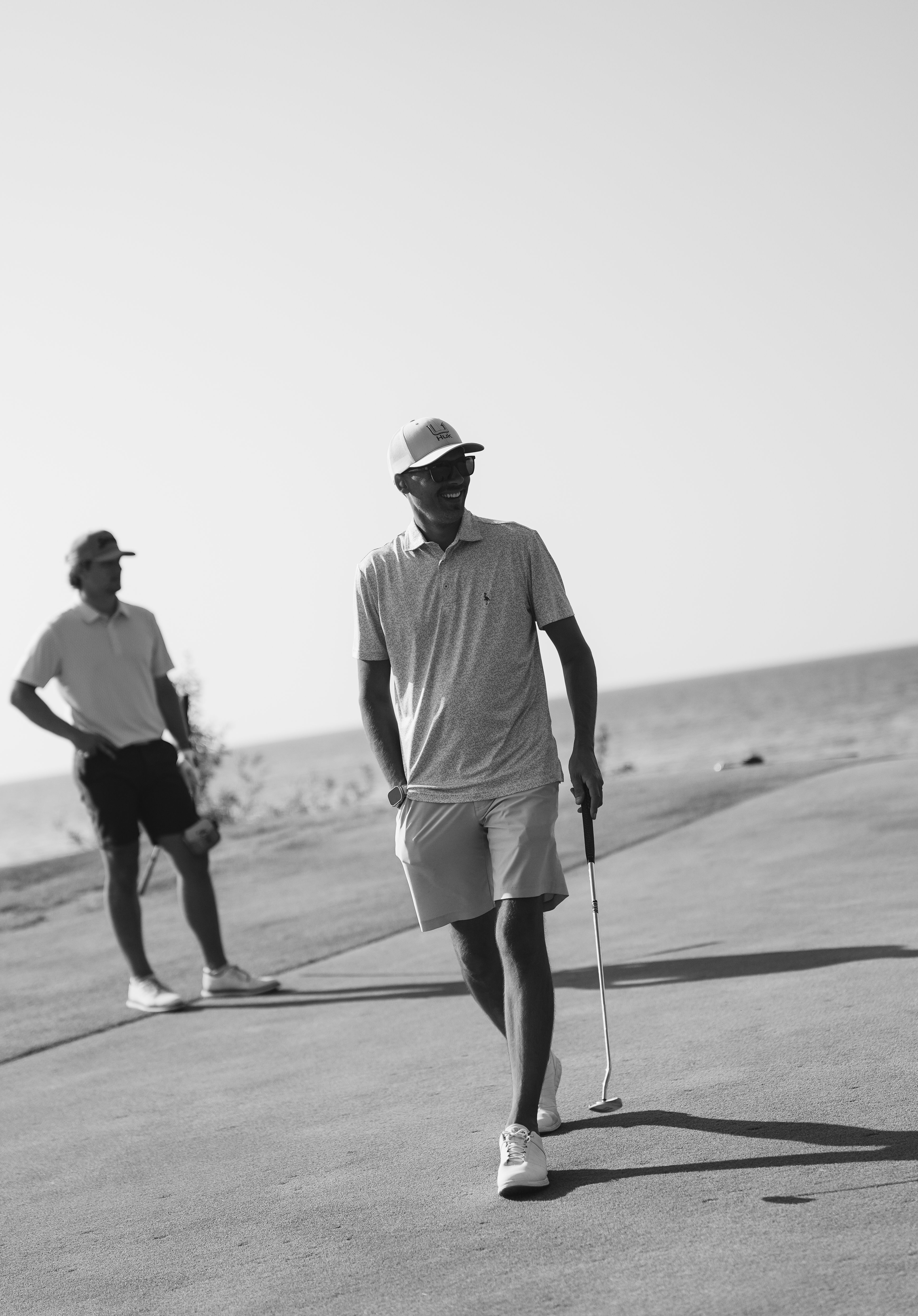 Golfer walking on Links green Bay Harbor Golf Club