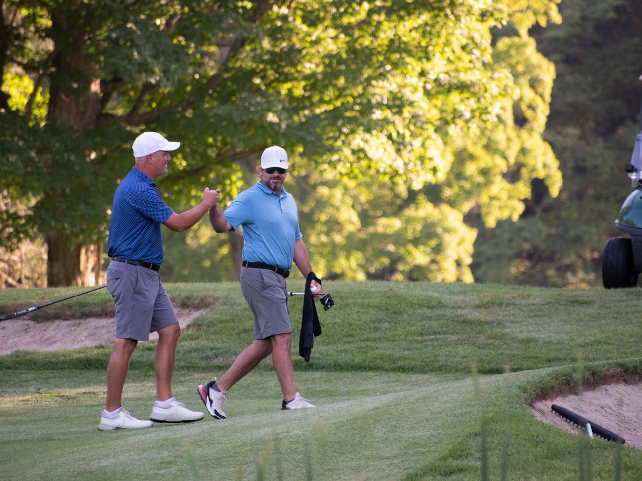 Golfer fist bump