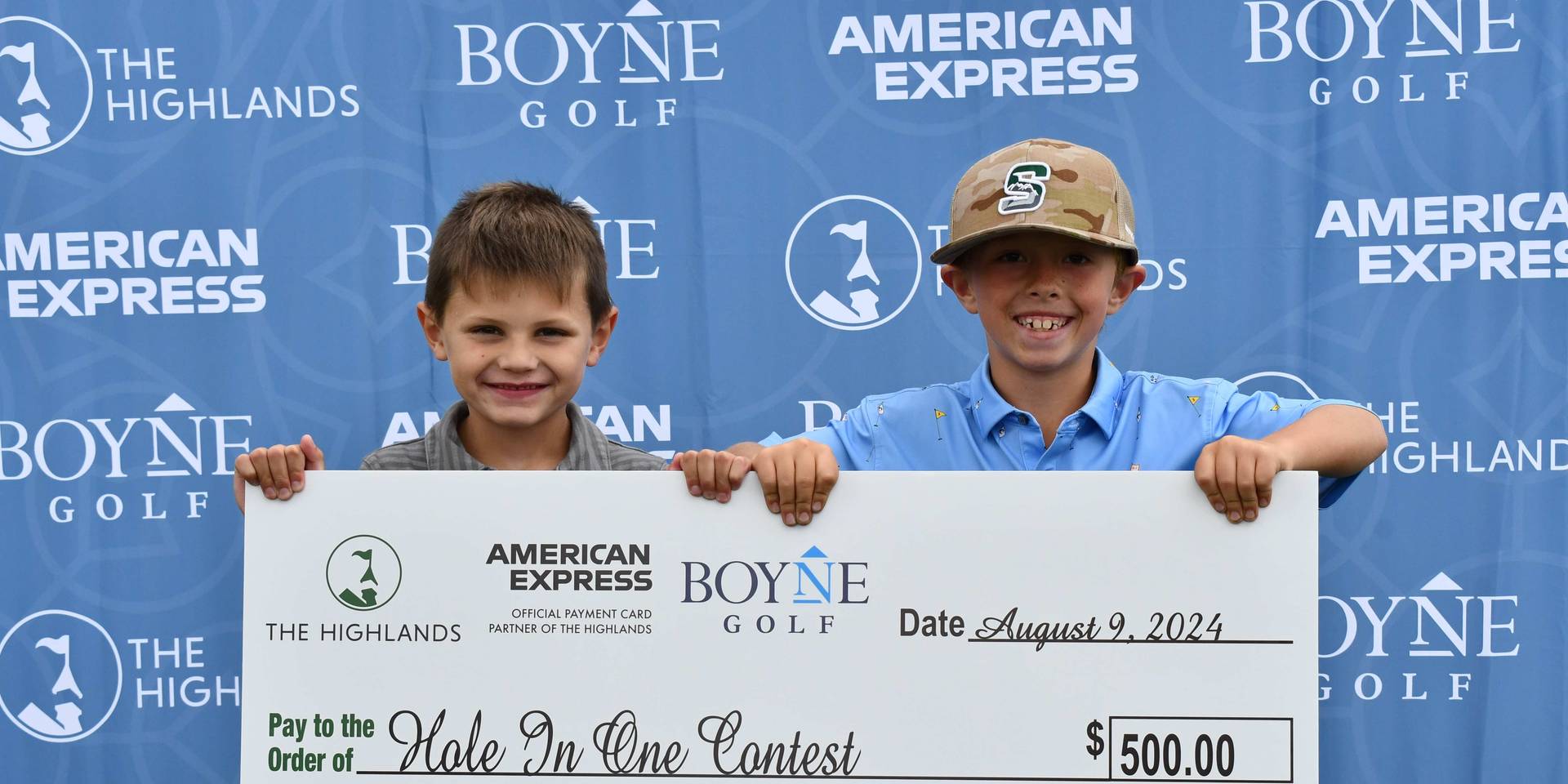 Kids with winners check