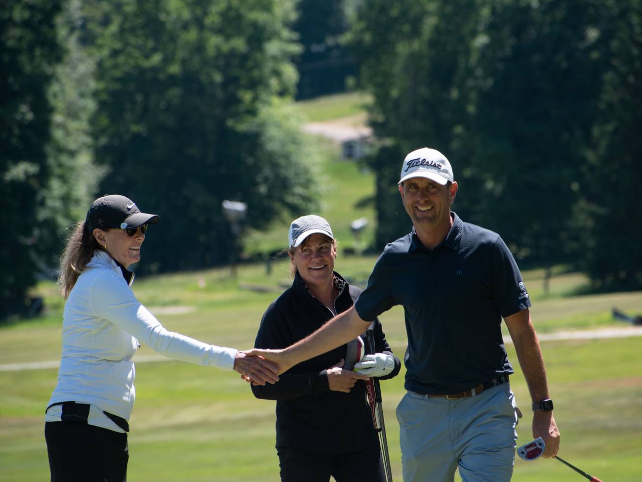 Members Golfing Fist Bump