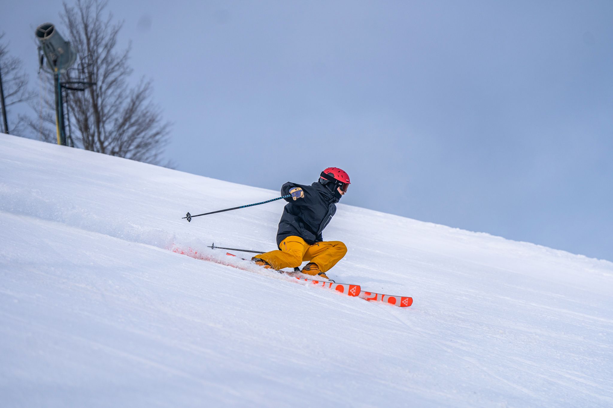 man ripping down slope