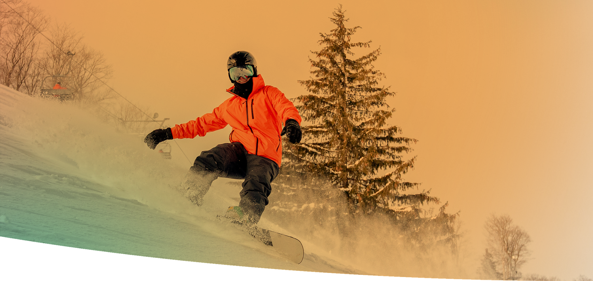man snowboarding down Heather