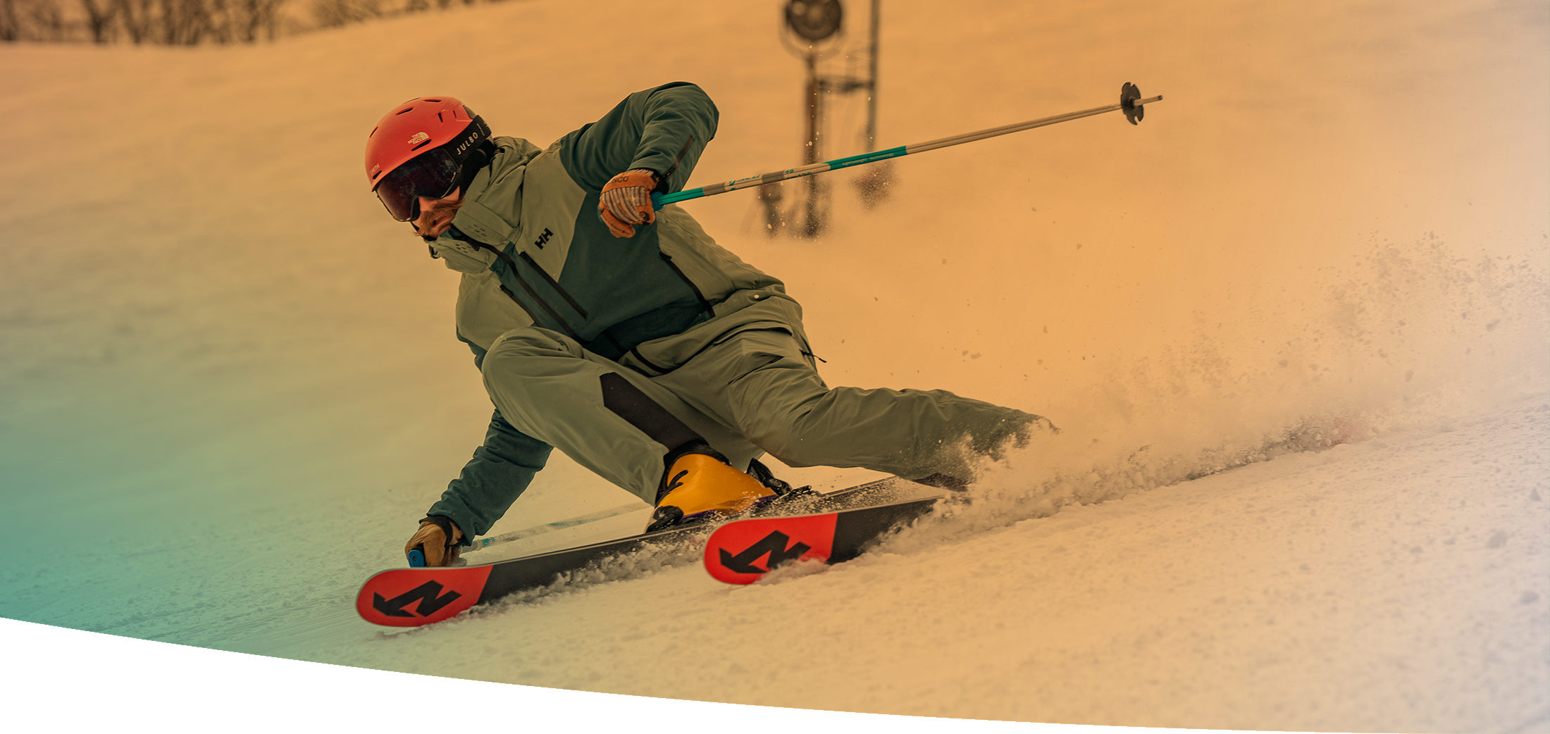 man boarding down the slopes