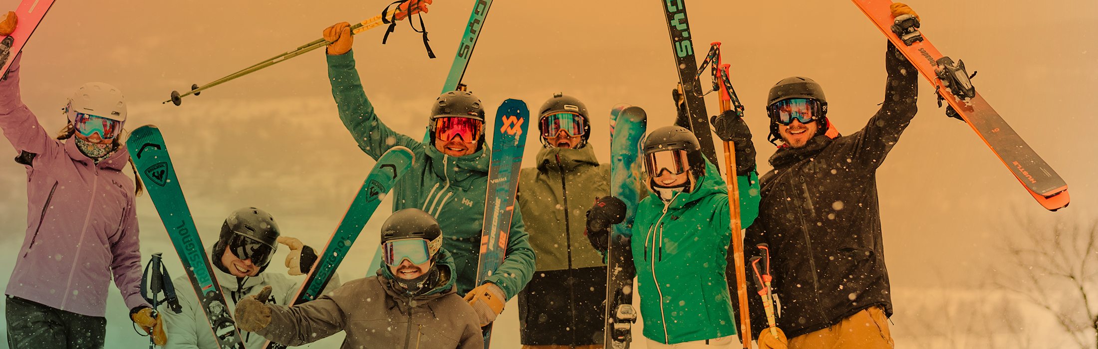 group of skier stoked at summit