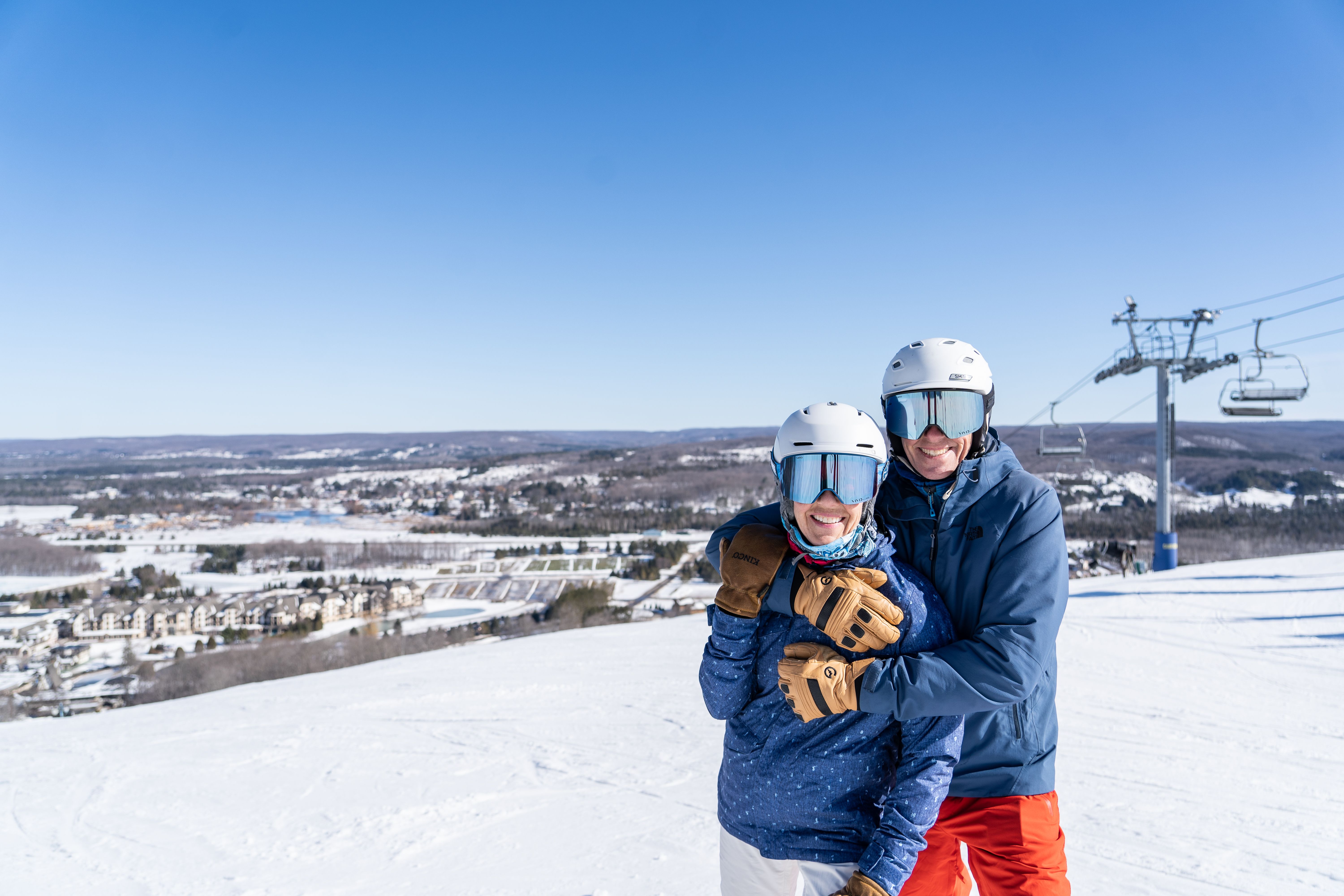 couple embracing at the top of Boyne Mountain