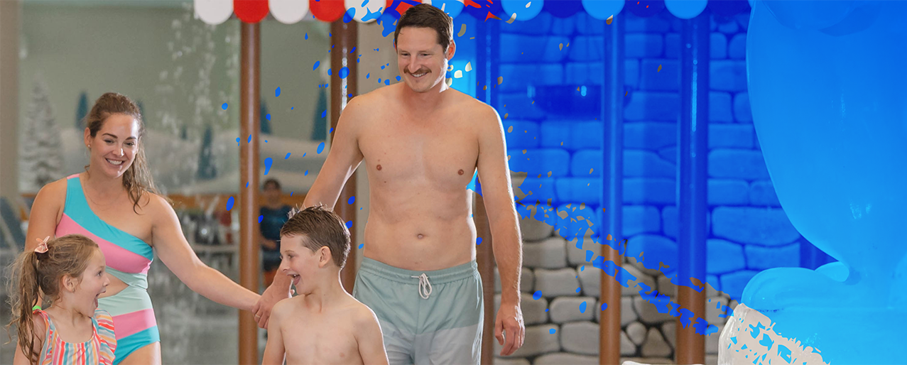family walking through waterpark