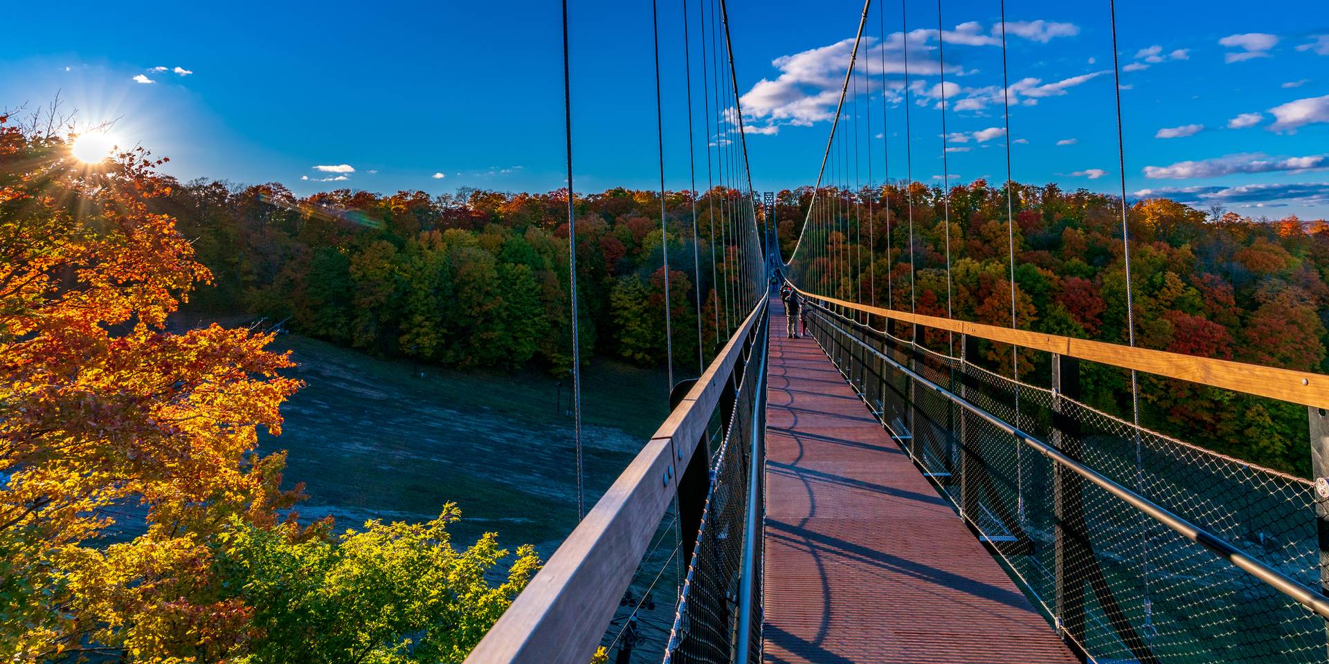 Guests walking SkyBridge in the fall