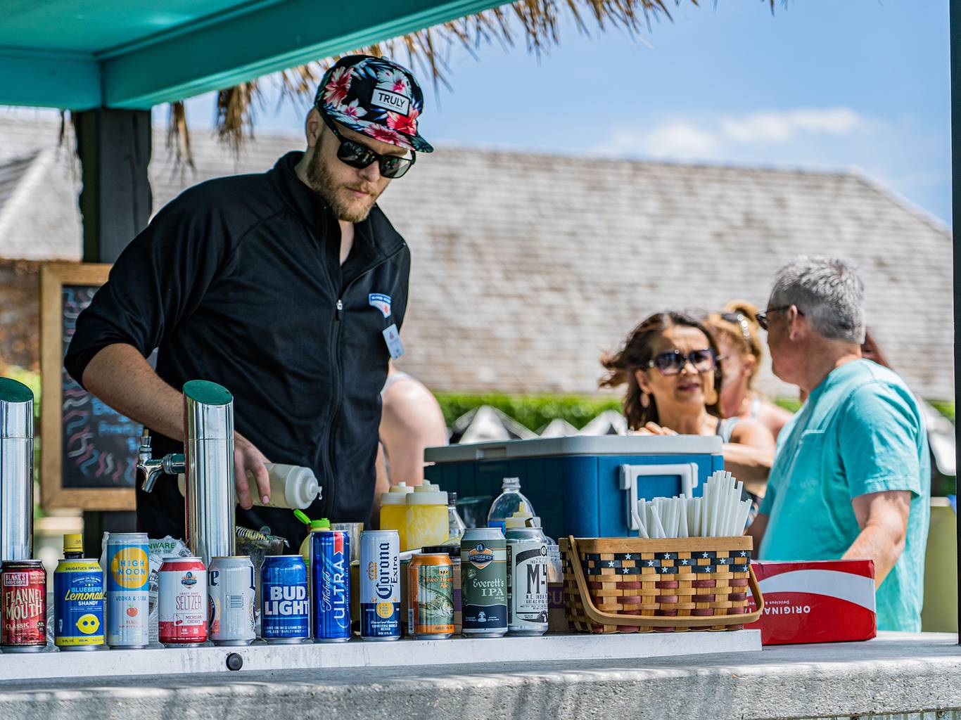 man pouring drinks at the Tiki Bar
