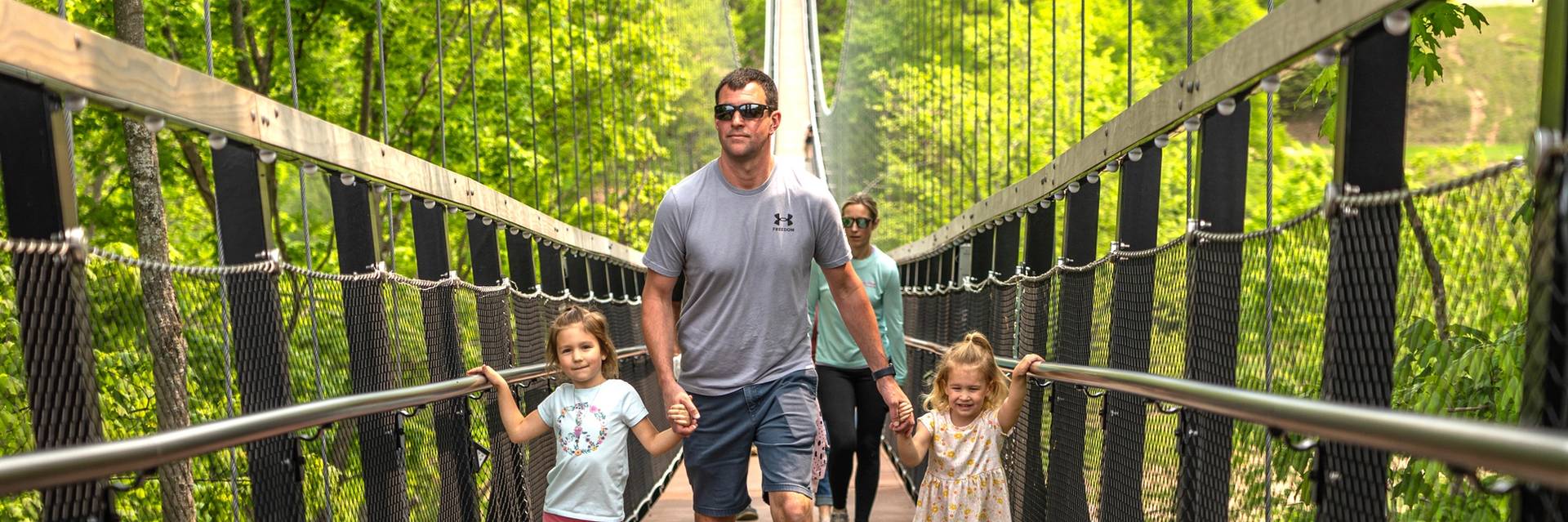 Father with two daughters on SkyBridge
